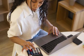 high-angle-woman-working-laptop high-angle-woman-working-laptop