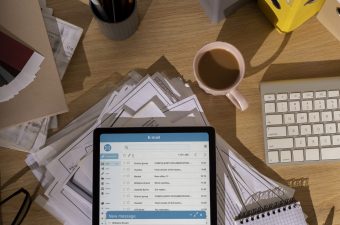 top-view-messy-office-workspace-with-tablet top-view-messy-office-workspace-with-tablet